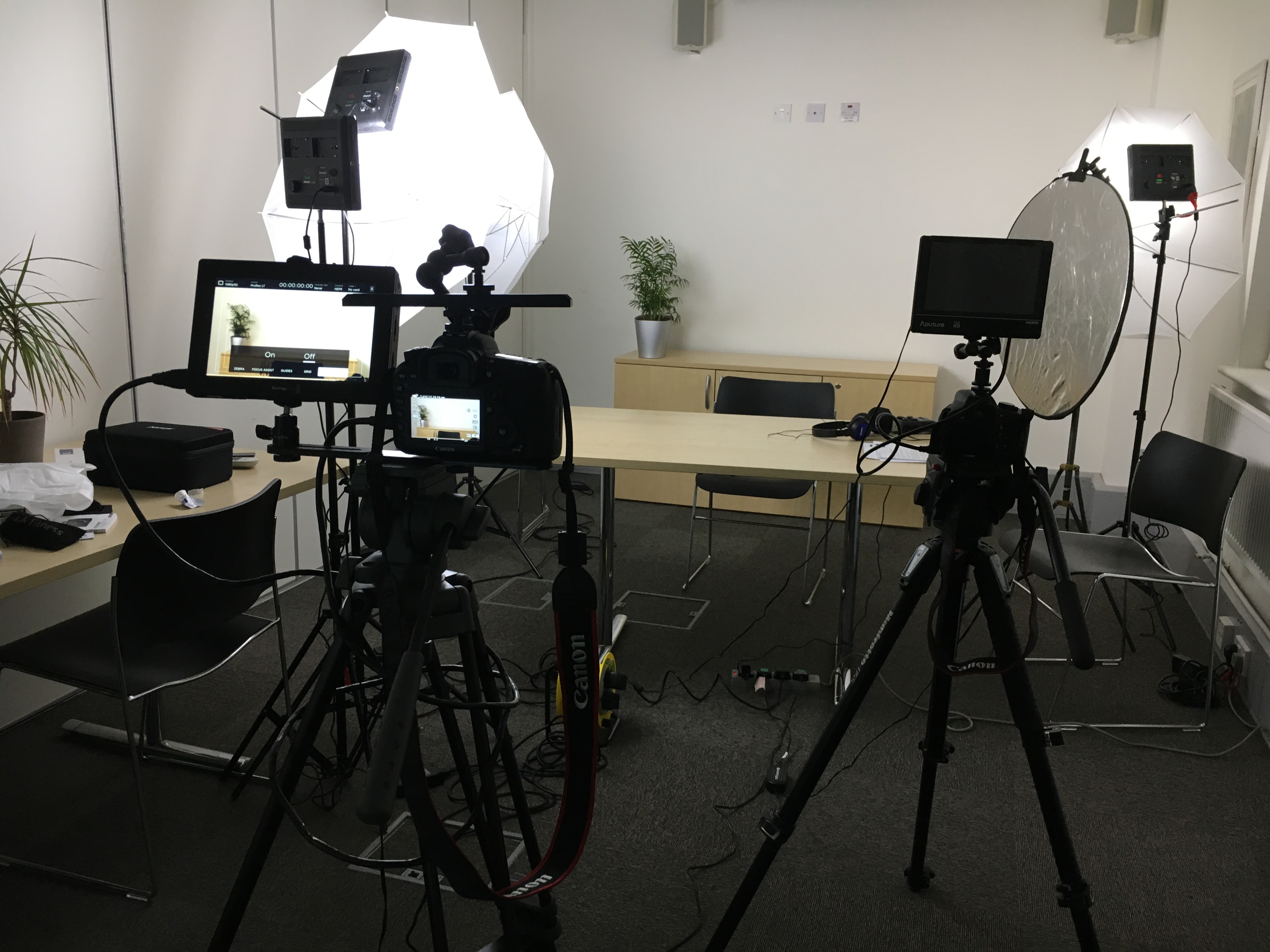 Interview filming Filming equipment set up in a room
